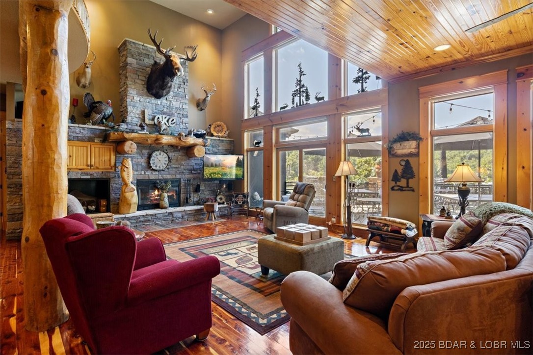 626 Grand Cove Road Sunrise Beach, MO 65079 - Photo 25 of 88 Cozy fireplace