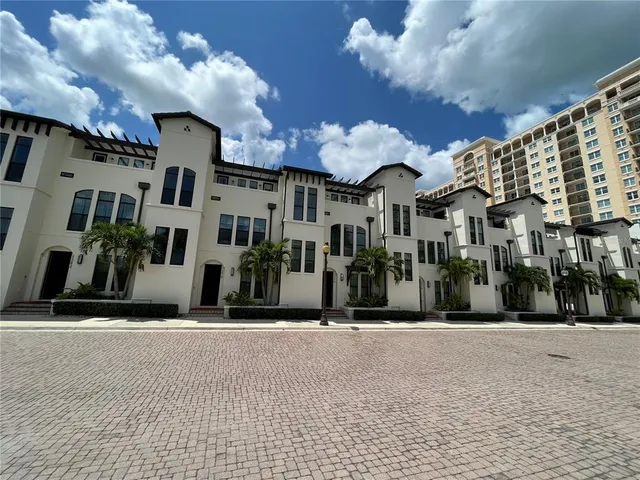 a view of a building with a street