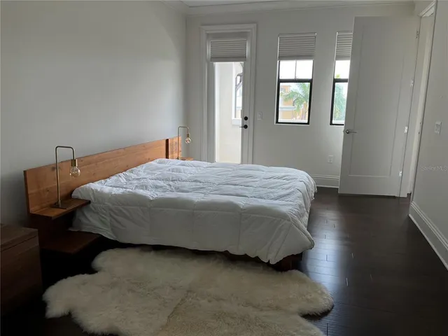 a bathroom with double sink and a mirror