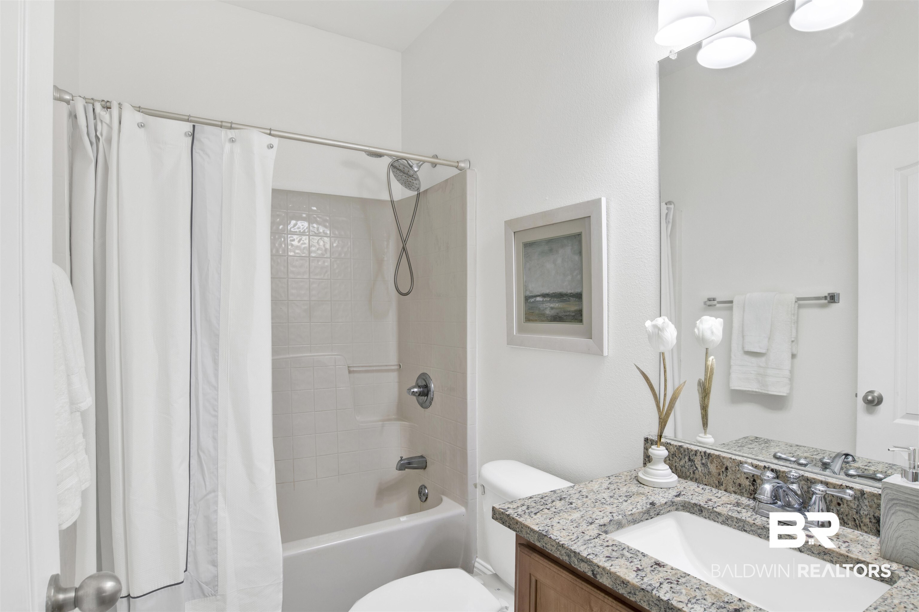 25350 Spindle Lane Daphne, AL 36526 - Photo 23 of 32 Full bathroom with vanity, shower / bath combination with curtain, and toilet