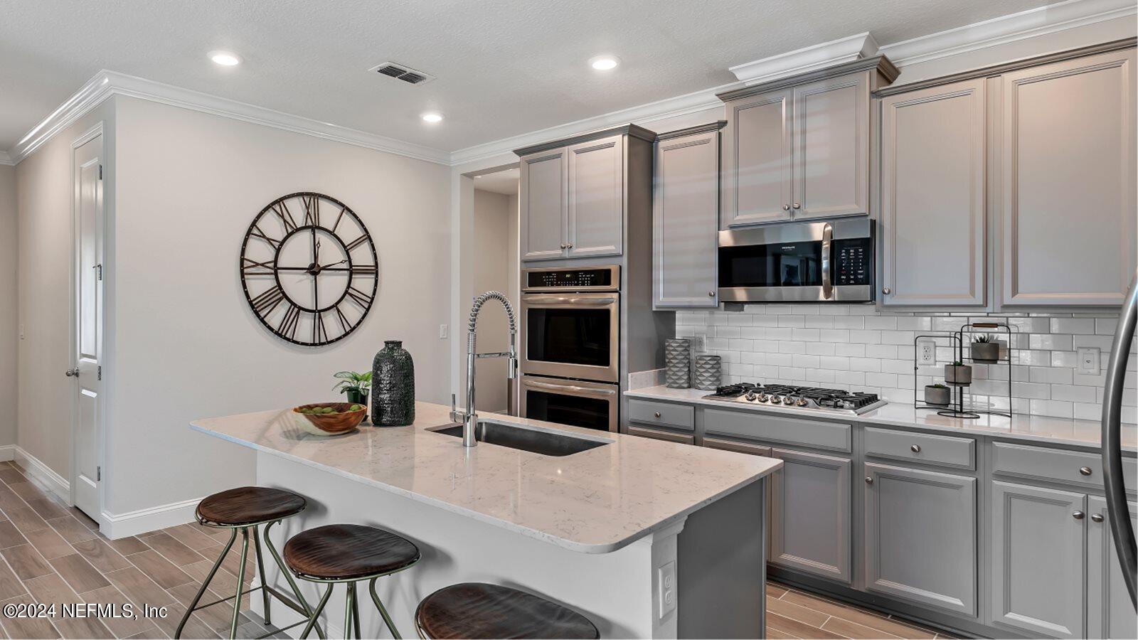 187 Simonson Run St. Augustine, FL 32092 - Photo 2 of 12 JAX_Stillwater_PIC_Topaz_Kitchen3_F1_9_2