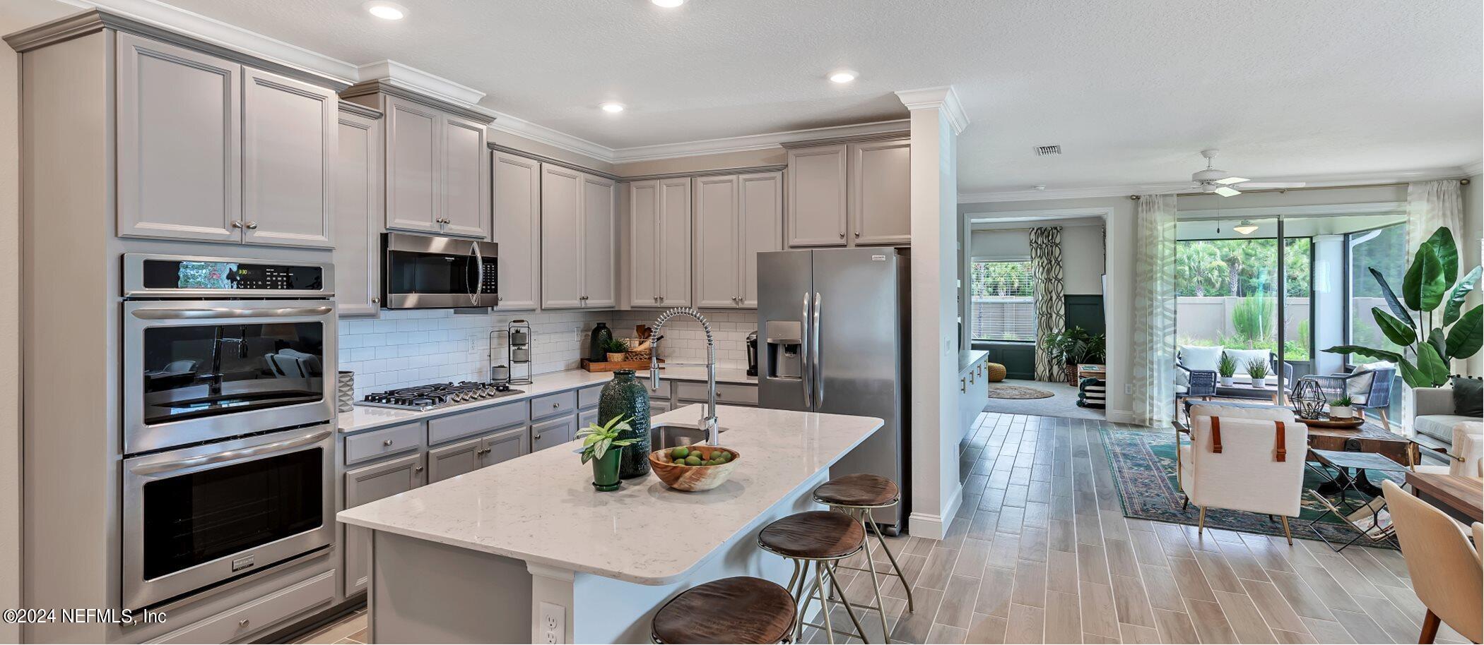 187 Simonson Run St. Augustine, FL 32092 - Photo 3 of 12 JAX_Stillwater_PIC_Topaz_Kitchen5_F1_9_2
