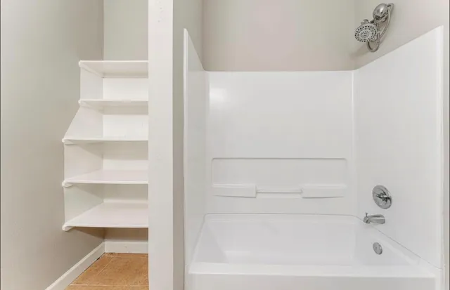 a bathroom with a bathtub