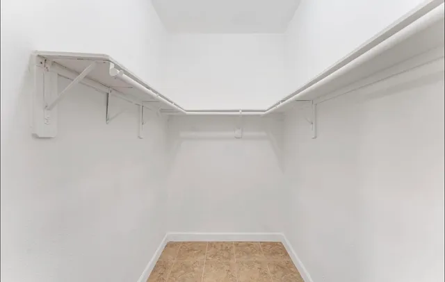 a view of small space with racks on the wall