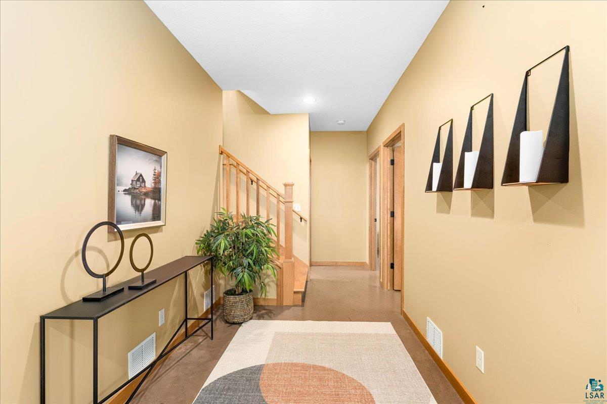 92598 Spells Road Sturgeon Lake, MN 55783 - Photo 40 of 60 Hall featuring baseboards and concrete flooring