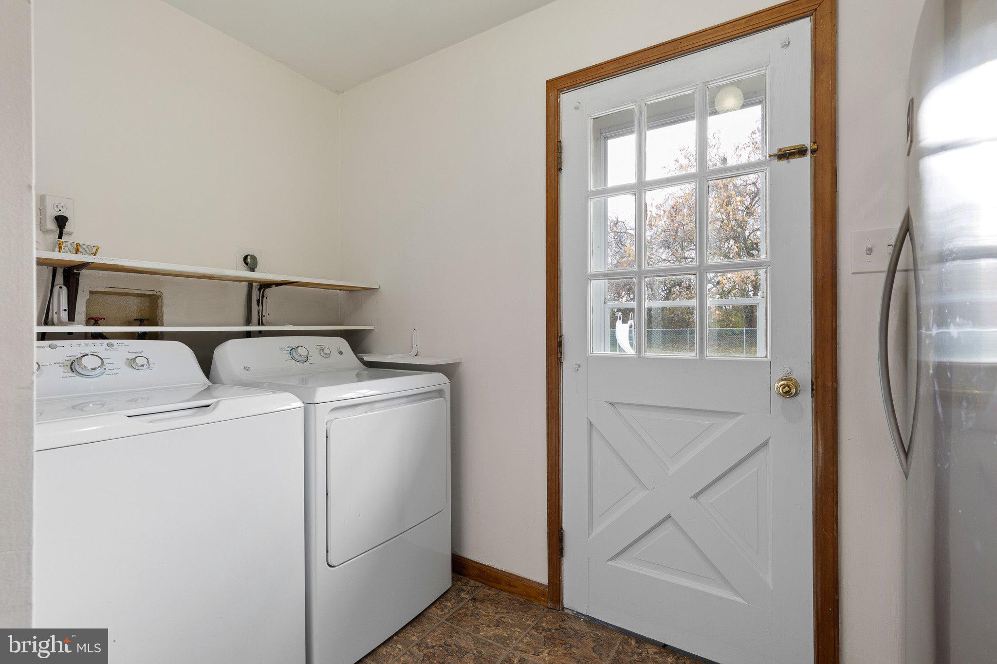 520 Chestnut Lane Townsend, DE 19734 - Photo 17 of 36 a utility room with dryer and washer