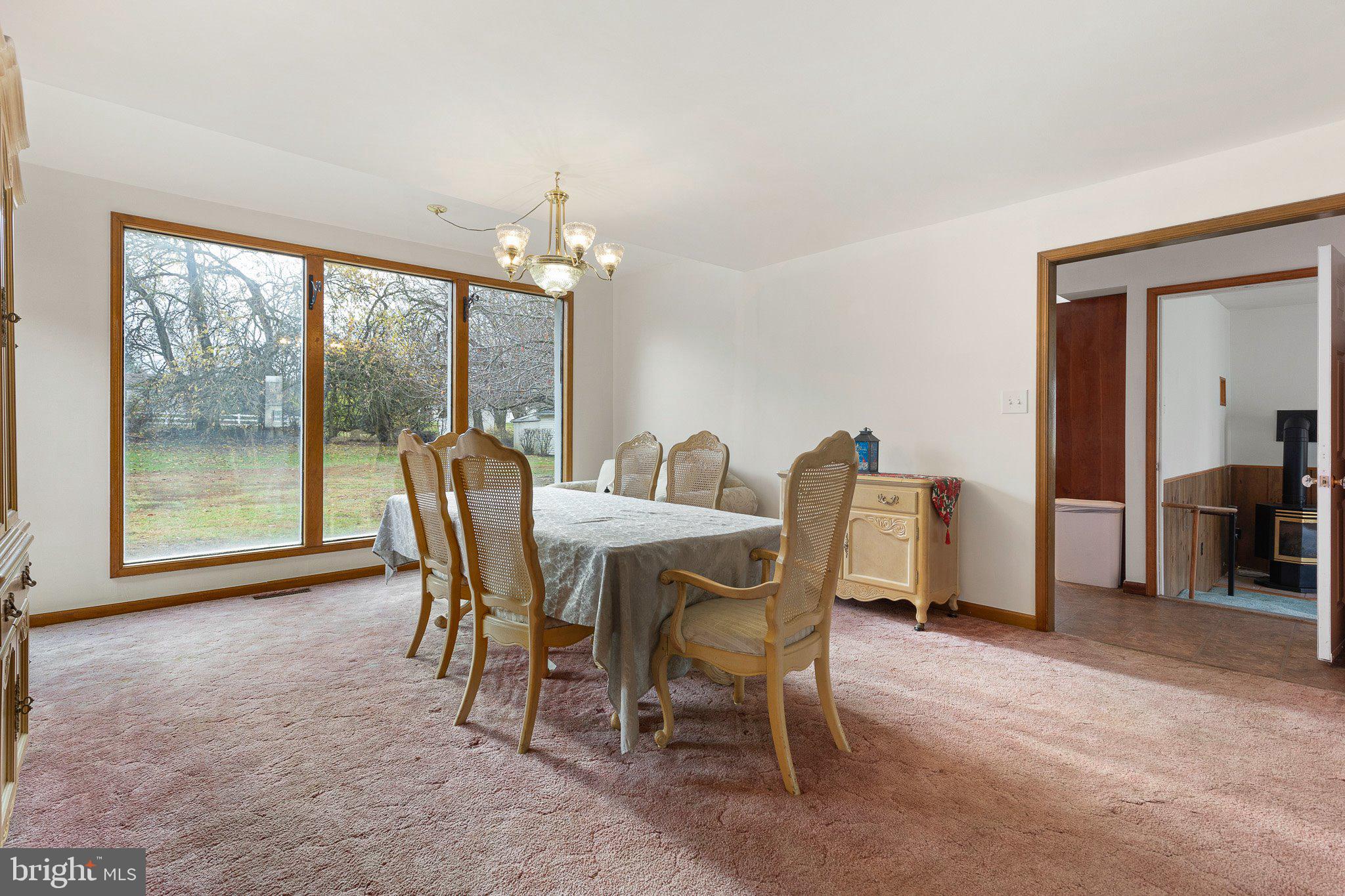 520 Chestnut Lane Townsend, DE 19734 - Photo 19 of 36 a view of a dining room with furniture window and outside view