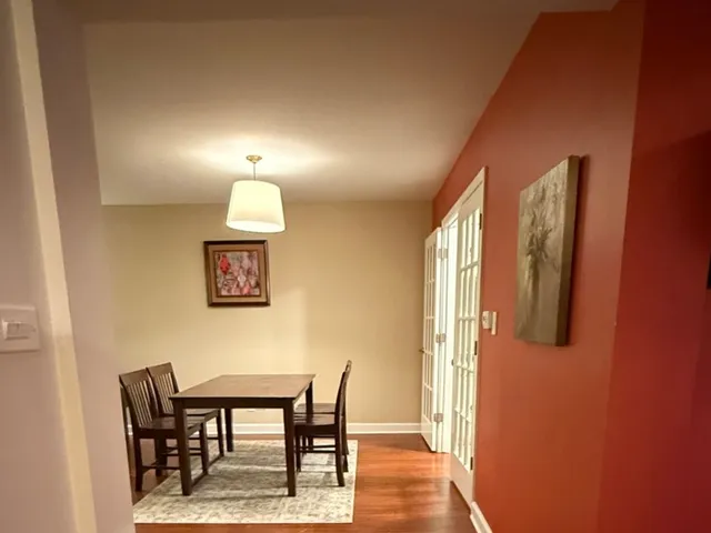 a view of a workspace with furniture