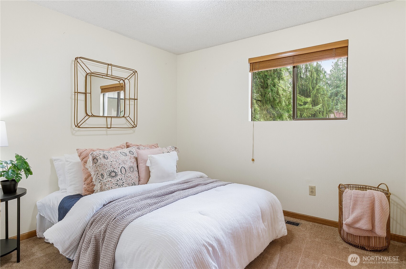 5119 136th Street Southwest Edmonds, WA 98026 - Photo 12 of 40 a bedroom with a bed and a window