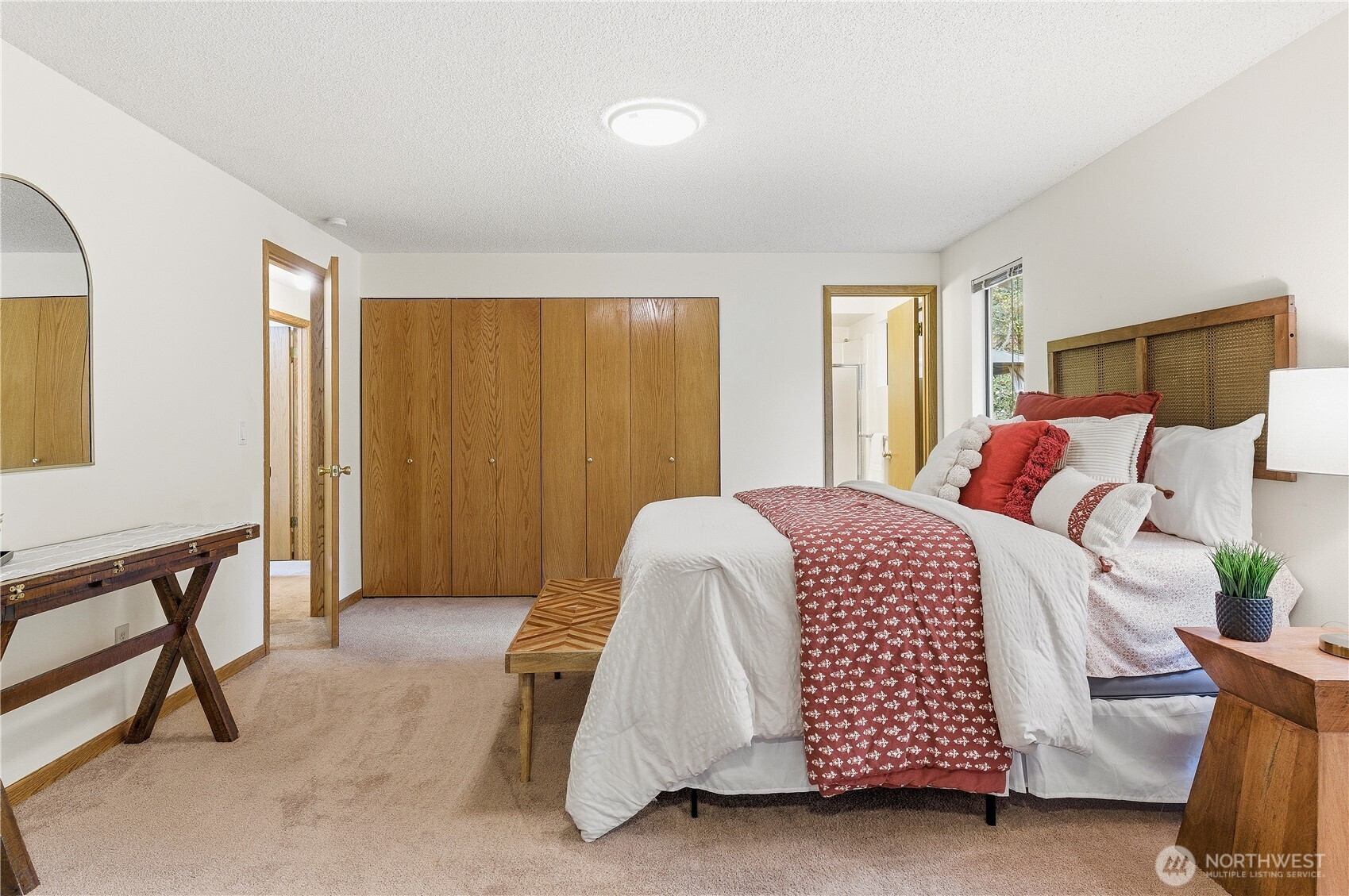 5119 136th Street Southwest Edmonds, WA 98026 - Photo 18 of 40 a bedroom with a bed and a window