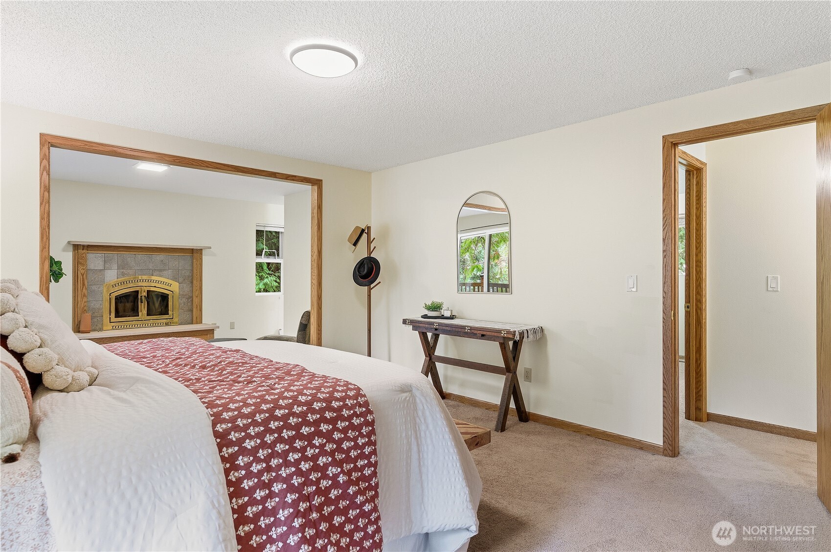 5119 136th Street Southwest Edmonds, WA 98026 - Photo 19 of 40 a bedroom with a bed and a potted plant