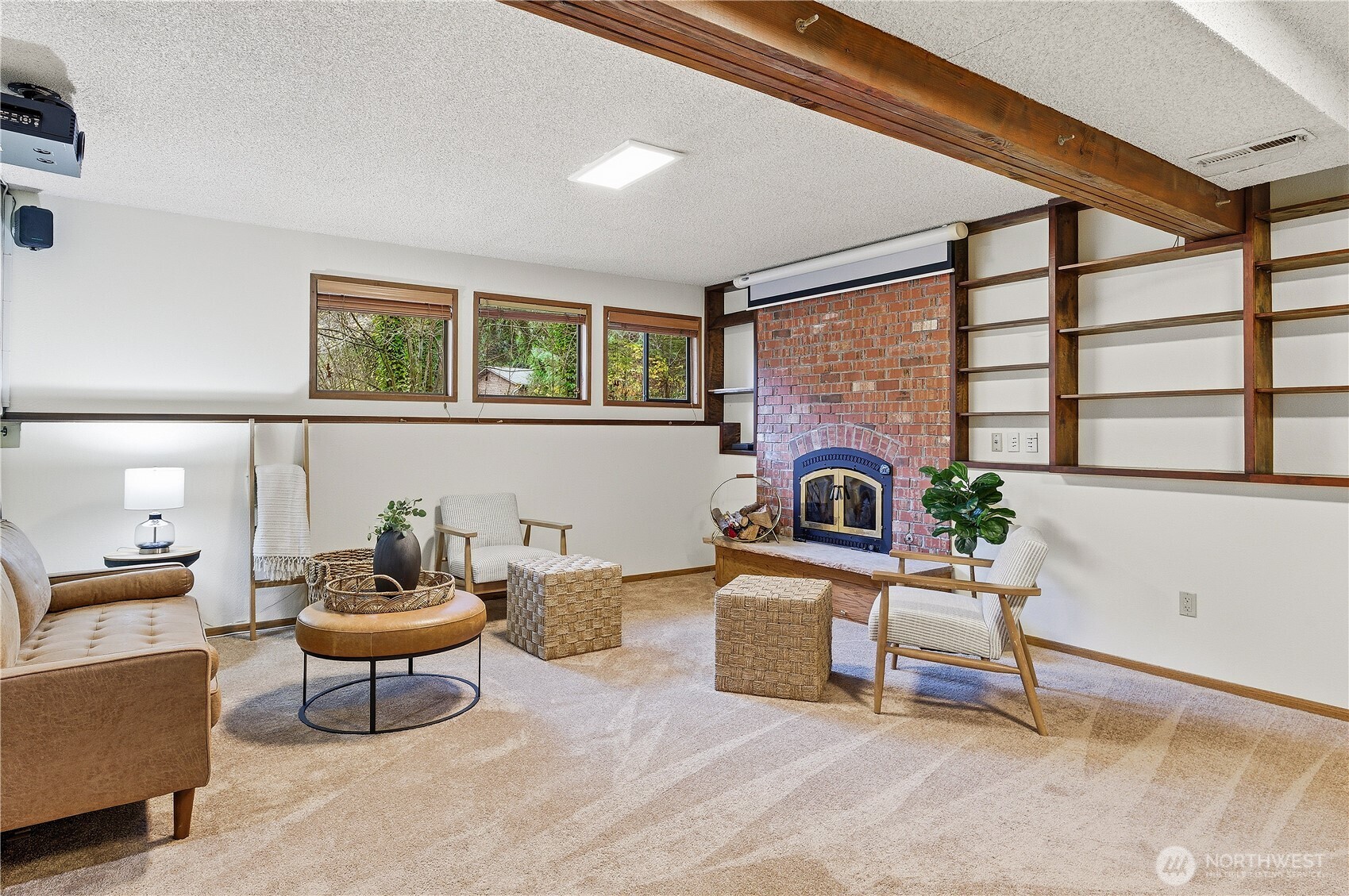 5119 136th Street Southwest Edmonds, WA 98026 - Photo 28 of 40 a living room with furniture a rug and a large window