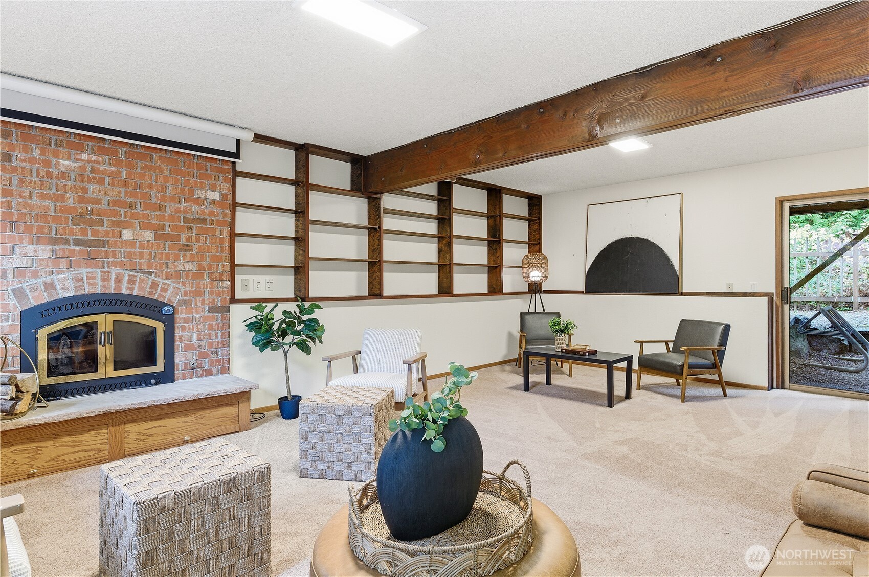 5119 136th Street Southwest Edmonds, WA 98026 - Photo 30 of 40 a living room with furniture and a fireplace