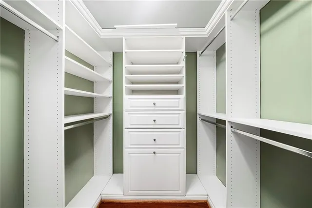 a view of an empty walk in closet