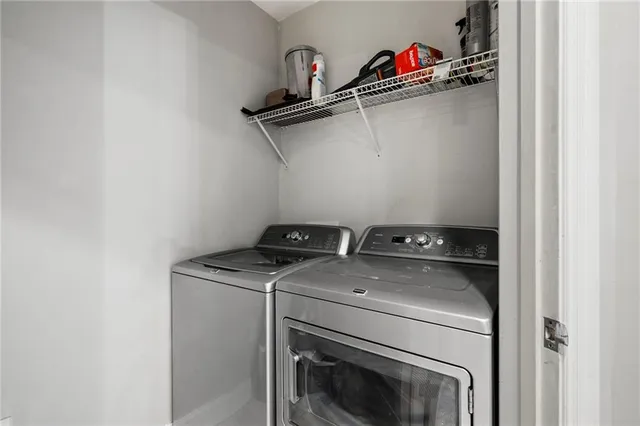 a utility room with dryer and washer