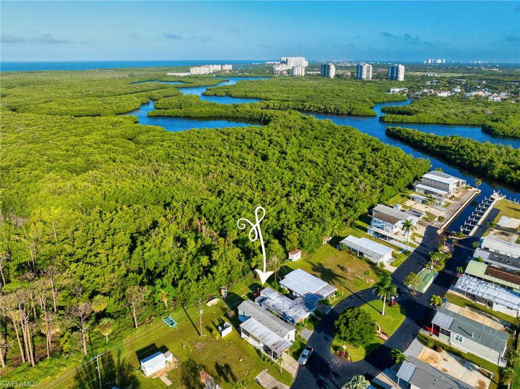 777 Walkerbilt Road, Unit 34 Naples, FL 34110 - Photo 18 of 23 Aerial View of the home and the Gulf of Mexico