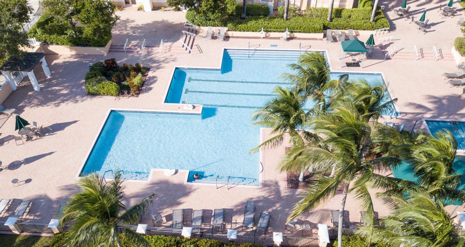 7961 Exeter Boulevard East, Unit 102 Tamarac, FL 33321 - Photo 35 of 46 an aerial view of a house with a yard and garden