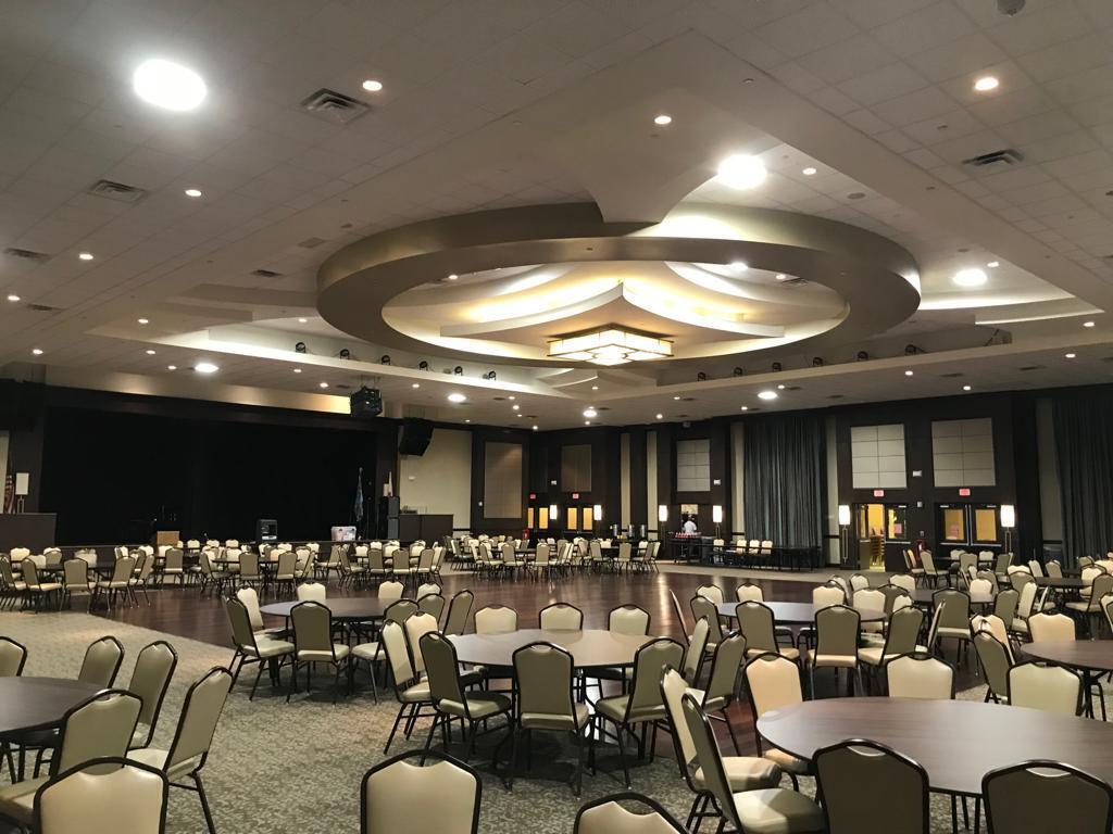 7961 Exeter Boulevard East, Unit 102 Tamarac, FL 33321 - Photo 39 of 46 a group of people sitting in a room with living room