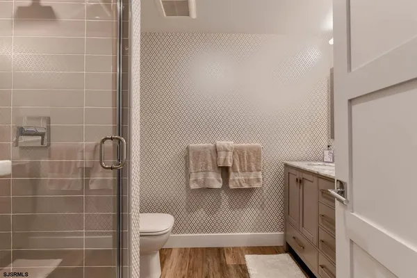 a bathroom with a sink and mirror