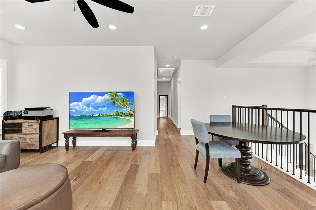 452 Jones Street Grapevine, TX 76051 - Photo 15 of 38 The second floor brings you this terrific transitional room - ready to fit your unique life style! Makes a great game room, play room for kids, second living area or even a home office!