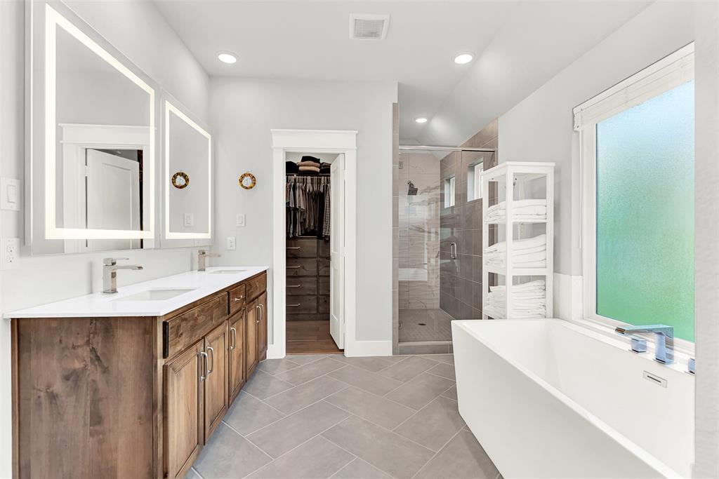 452 Jones Street Grapevine, TX 76051 - Photo 20 of 38 You'll think you've walked into a luxurious spa when you enter the primary bath!