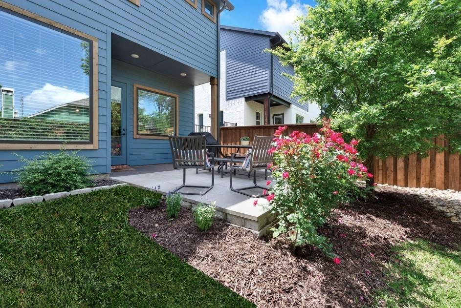 452 Jones Street Grapevine, TX 76051 - Photo 2 of 38 The backyard is lush with green grass, blooming bushes and shady trees! Spend quiet evenings on the newly built patio, enjoying your favorite beverages and listening to the sounds of nature.