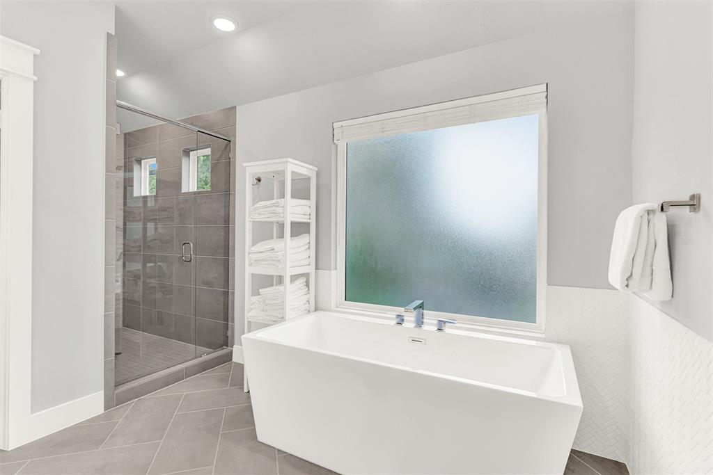 452 Jones Street Grapevine, TX 76051 - Photo 21 of 38 Relax in ultimate comfort after a long day in the deep stand-alone soaker tub!
