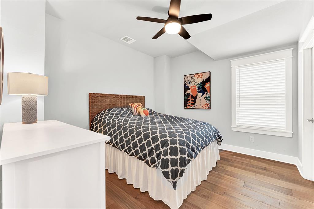 452 Jones Street Grapevine, TX 76051 - Photo 23 of 38 Bedroom 2 is also sunny and bright!