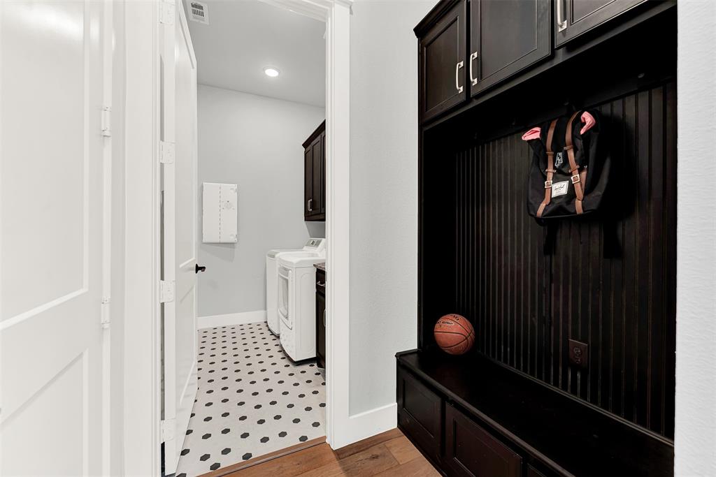 452 Jones Street Grapevine, TX 76051 - Photo 27 of 38 Just inside the garage door is a great mud room with a place for coats, backpacks, purses, shoes....you'll always be organized!