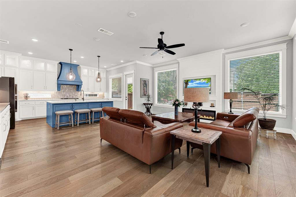 452 Jones Street Grapevine, TX 76051 - Photo 7 of 38 The rest of the "great room" is equally amazing! Rich hardwood floors, large windows, canned lighting are ideala for entertaining!