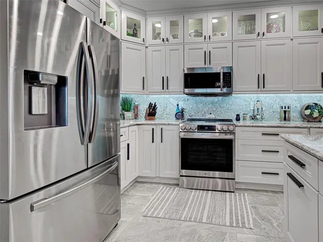 a work room with furniture and wooden floor