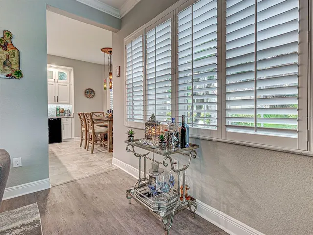 a reading room with furniture and a window