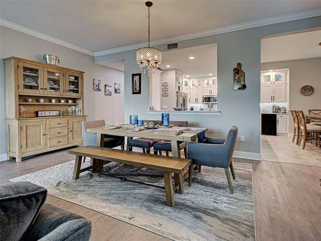 a bed room with a bed and a television