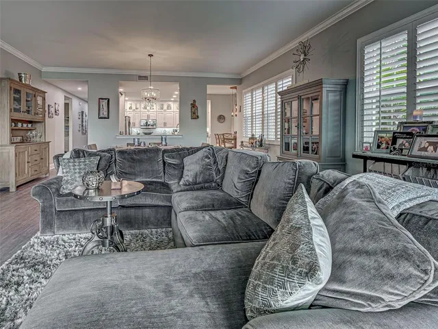 a spacious bathroom with a granite countertop sink and a mirror