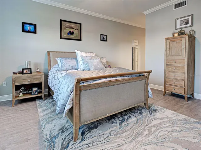 a bathroom with a granite countertop sink and shower