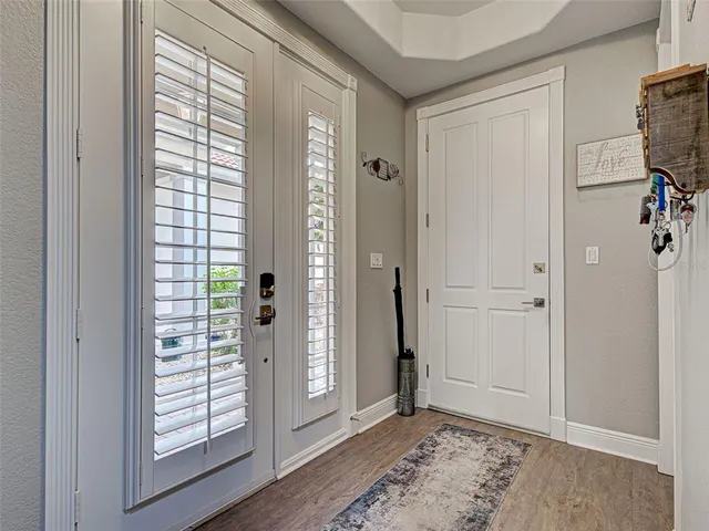 a room with furniture and wooden floor