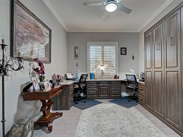 a large bathroom with a granite countertop sink a mirror and a shower