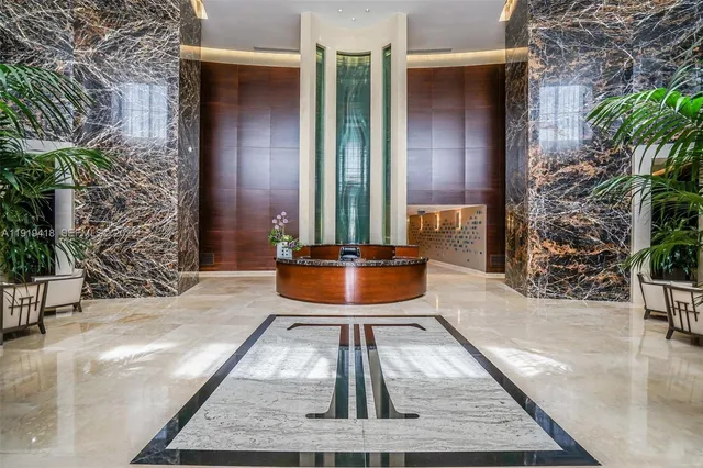 a view of a swimming pool with a lounge chairs