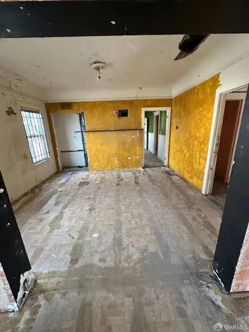 a view of livingroom with hardwood floor and window