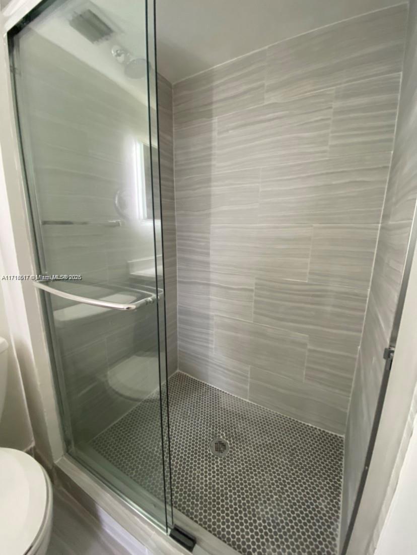 13499 Biscayne Boulevard, Unit 1507 North Miami, FL 33181 - Photo 21 of 34 a bathroom with a shower