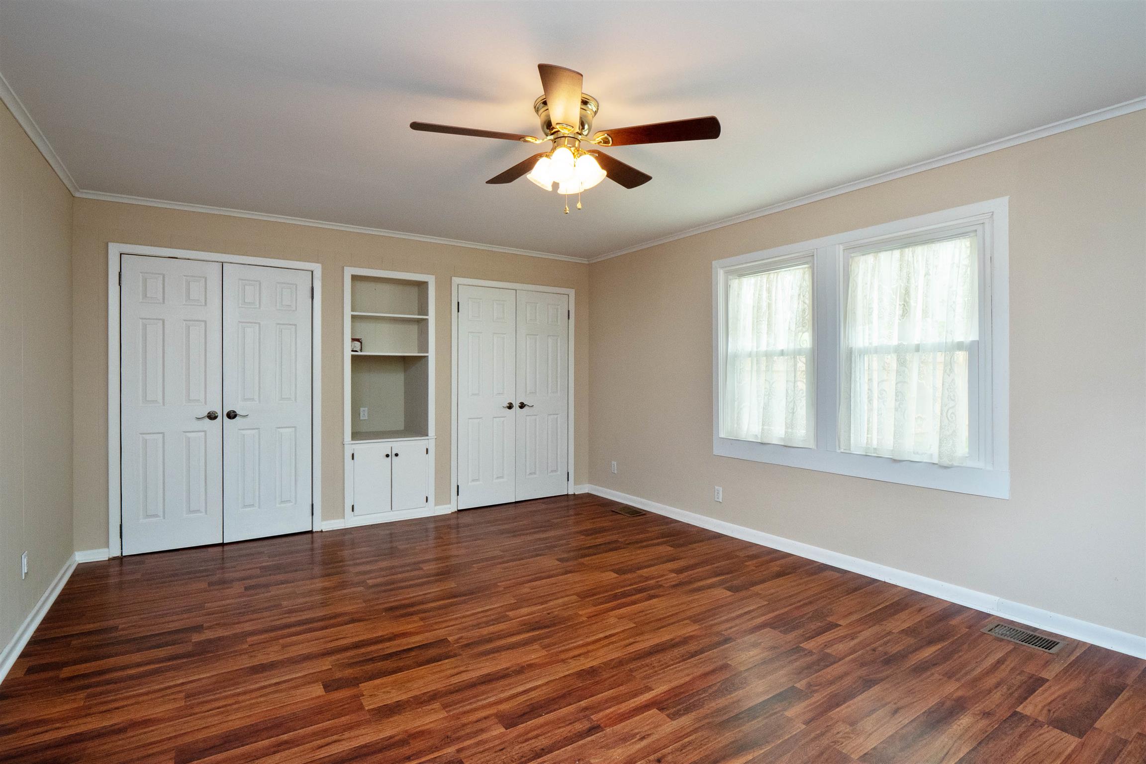 2304 Ruth Street Springfield, TN 37172 - Photo 14 of 21 Large bedroom with double closets and built in shelving.