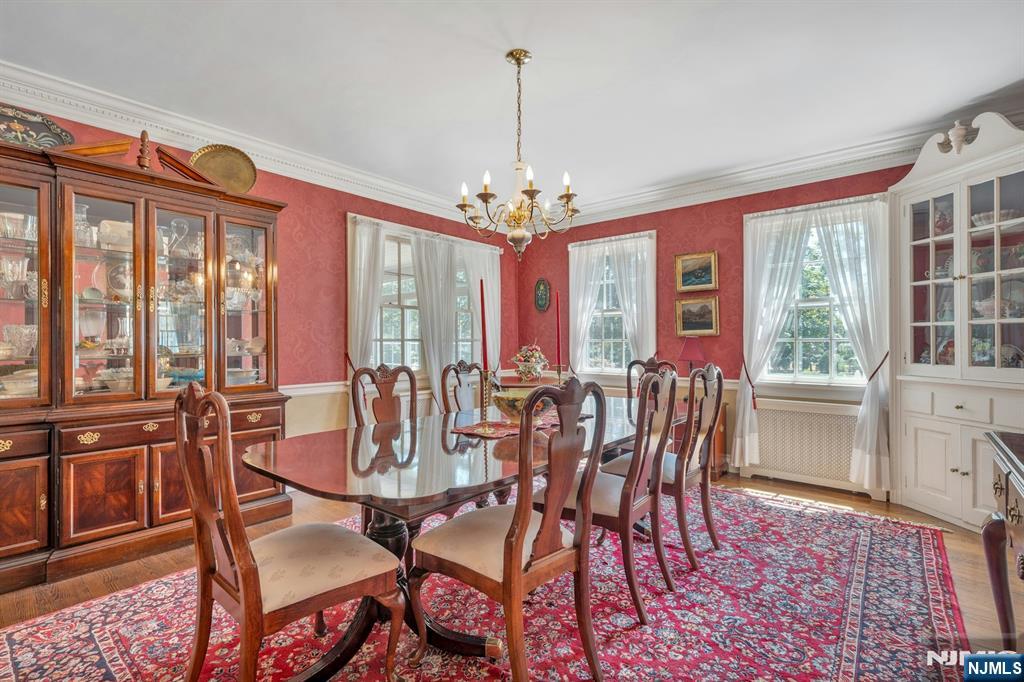 174 Paramus Road Paramus, NJ 07652 - Photo 14 of 45 a view of a dining room with furniture window and outside view