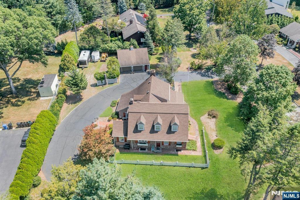 174 Paramus Road Paramus, NJ 07652 - Photo 2 of 45 an aerial view of a house with garden space and street view