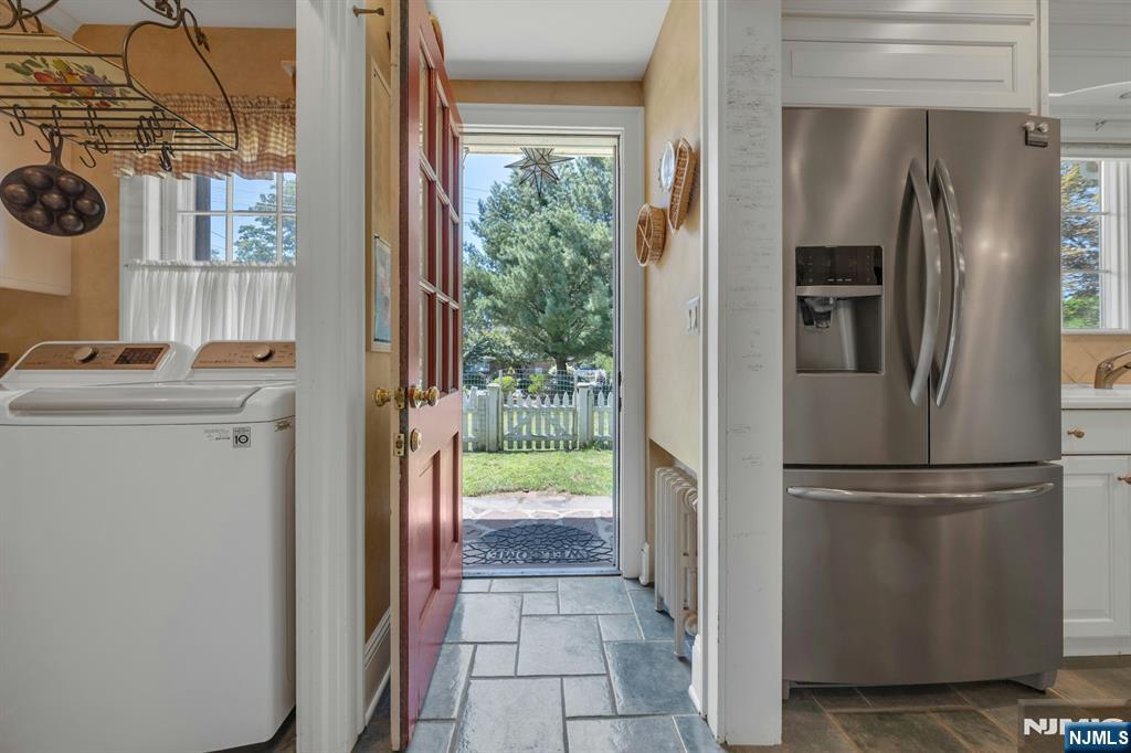 174 Paramus Road Paramus, NJ 07652 - Photo 23 of 45 a kitchen with a refrigerator and a sink