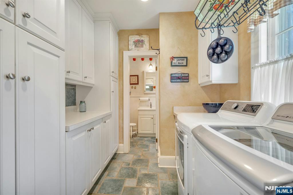 174 Paramus Road Paramus, NJ 07652 - Photo 24 of 45 a view of bathroom with dual sinks