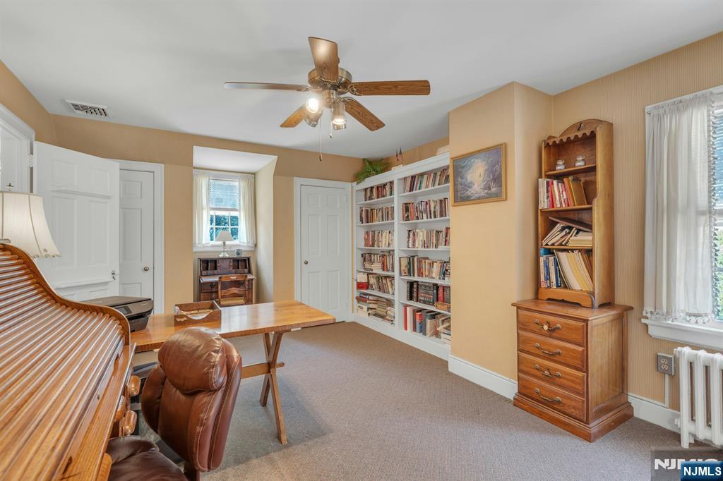 174 Paramus Road Paramus, NJ 07652 - Photo 35 of 45 a room with furniture and gym equipment