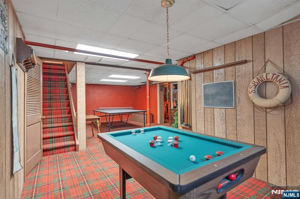 174 Paramus Road Paramus, NJ 07652 - Photo 36 of 45 a room with pool table and windows