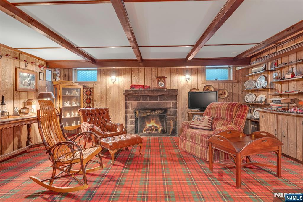 174 Paramus Road Paramus, NJ 07652 - Photo 37 of 45 a view of a livingroom with furniture and a fireplace