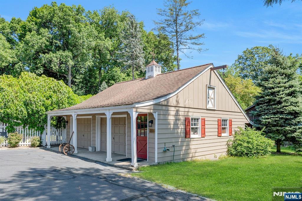174 Paramus Road Paramus, NJ 07652 - Photo 42 of 45 a view of a house with a yard