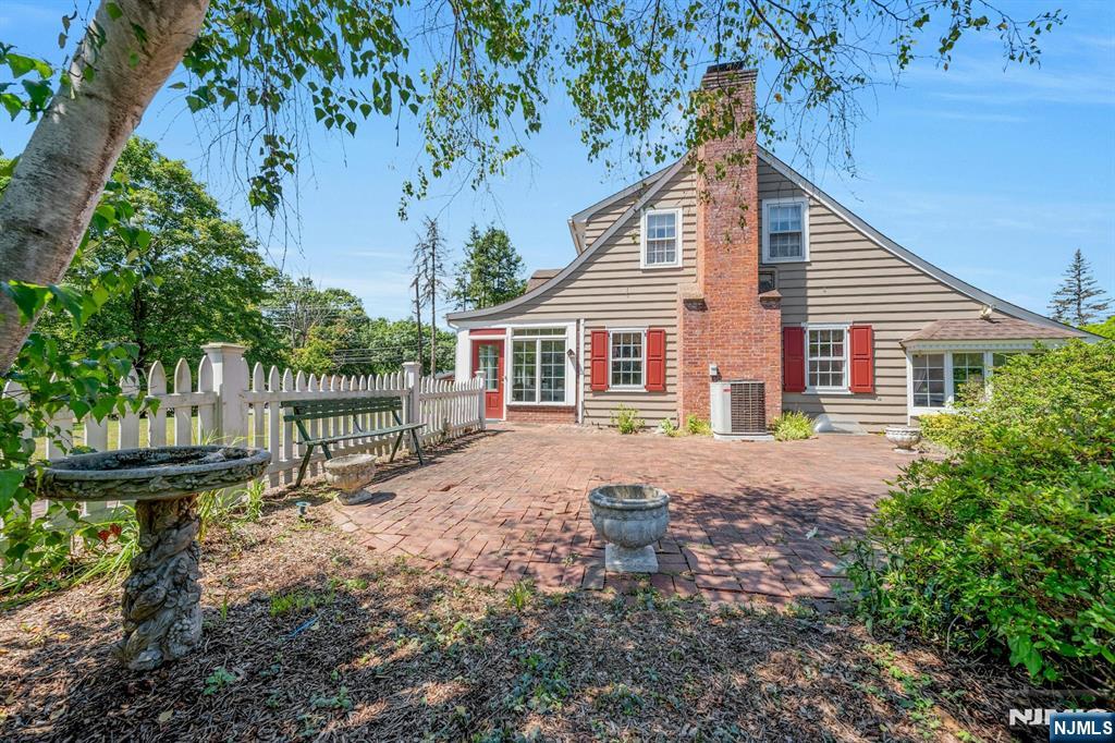 174 Paramus Road Paramus, NJ 07652 - Photo 44 of 45 a view of a house with a yard